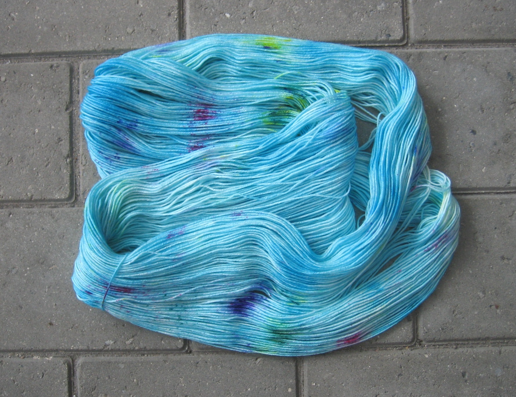 rvet-garn-speckles-tynd-merino-uld-superwash-turkis